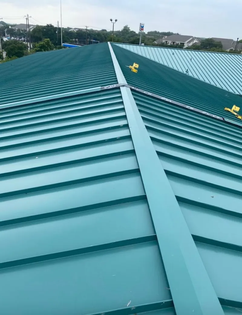 Green commercial metal roof ridge and valley for Metal Roof Repair in Malvern